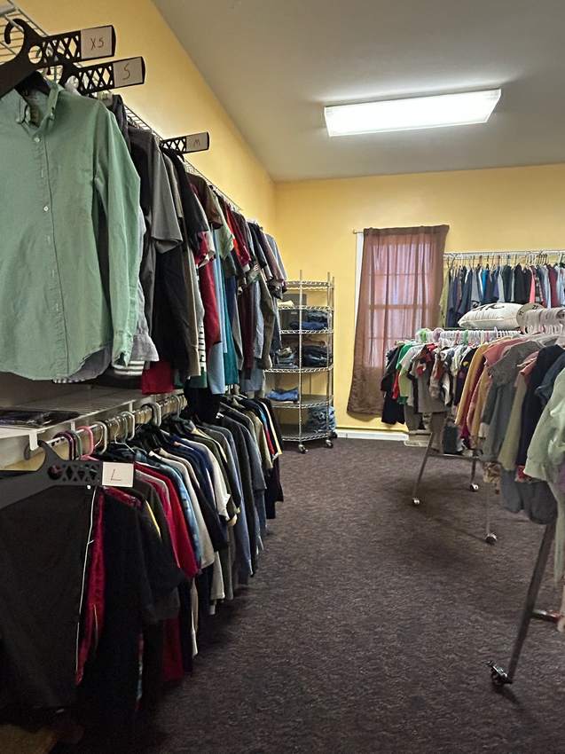 Men’s clothing racks at Kenny’s Kloset